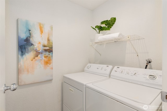 washroom with laundry area and washer and clothes dryer