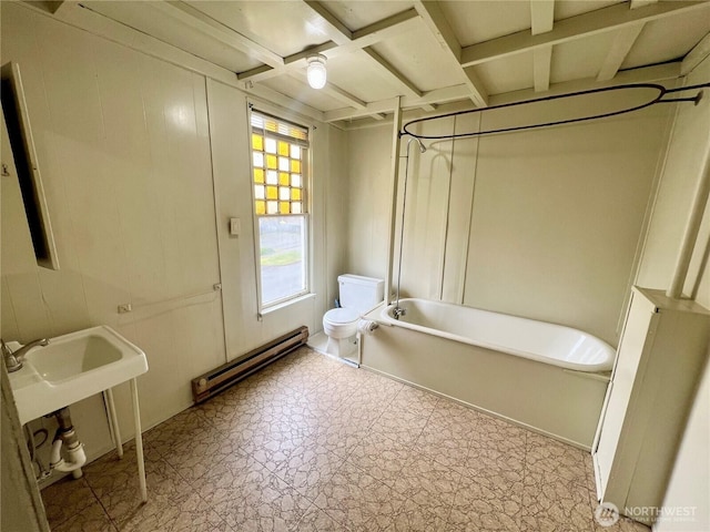 full bathroom with a baseboard radiator, shower / tub combination, toilet, coffered ceiling, and tile patterned floors