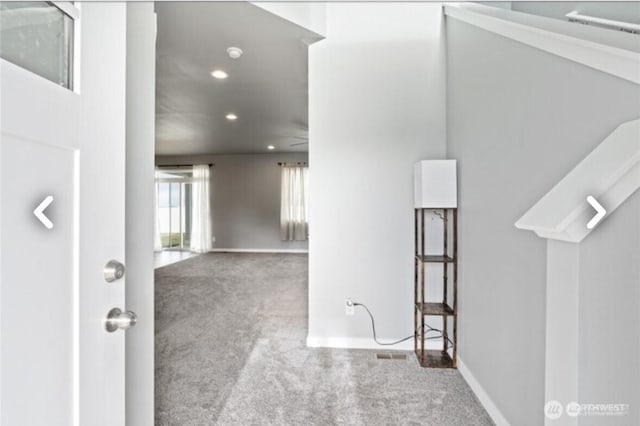 interior space featuring recessed lighting, carpet flooring, and baseboards