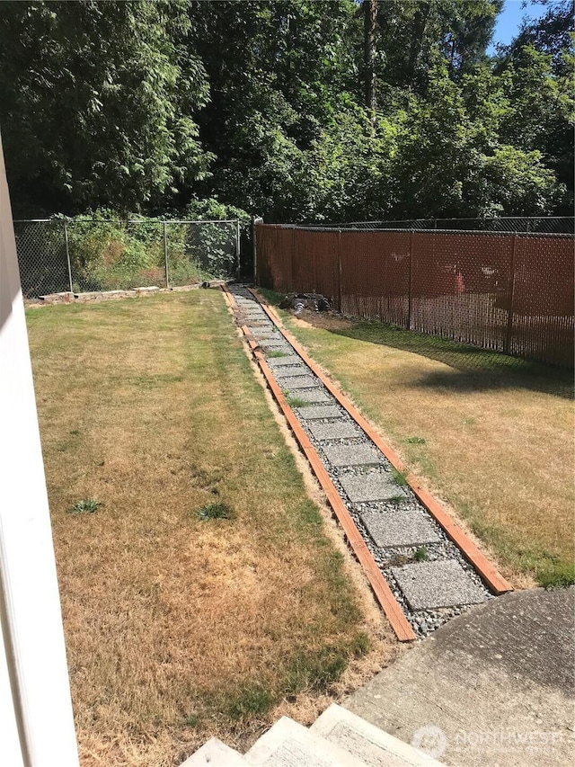 view of yard with fence