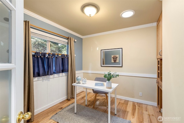 office featuring crown molding, baseboards, and wood finished floors