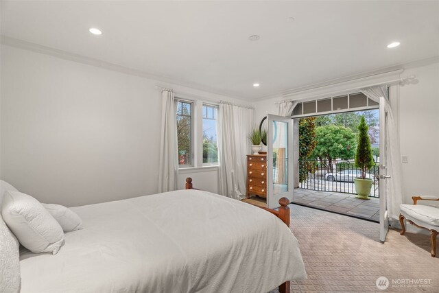 carpeted bedroom featuring access to outside, crown molding, and recessed lighting