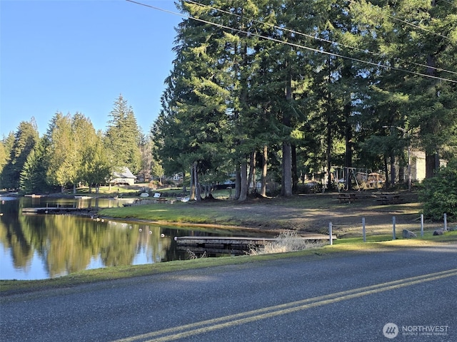 view of road featuring a water view