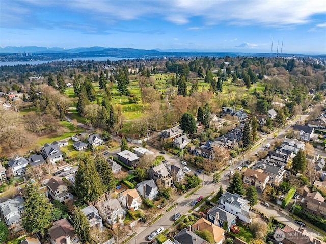 drone / aerial view with a mountain view and a residential view