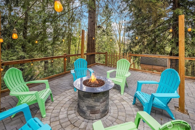 view of patio / terrace featuring a fire pit