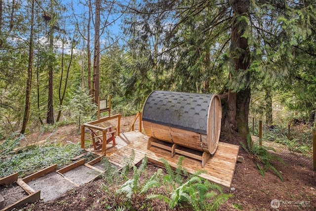 exterior space with an outbuilding and a storage unit