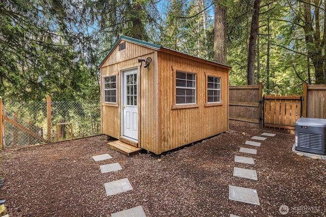 view of outbuilding featuring an outbuilding and a fenced backyard