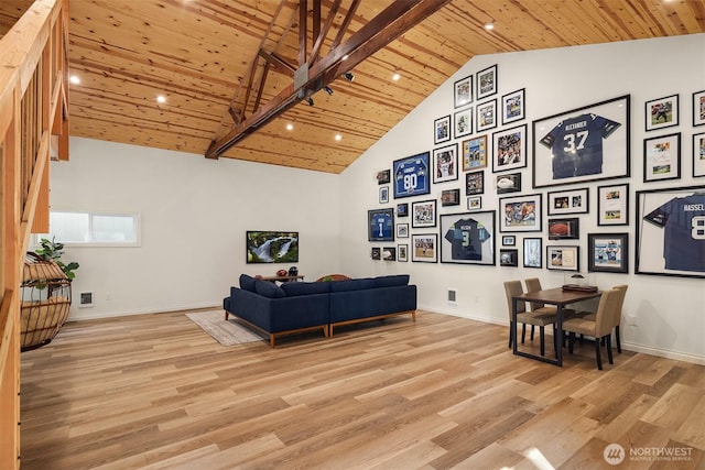 sitting room featuring high vaulted ceiling, wooden ceiling, and light wood finished floors