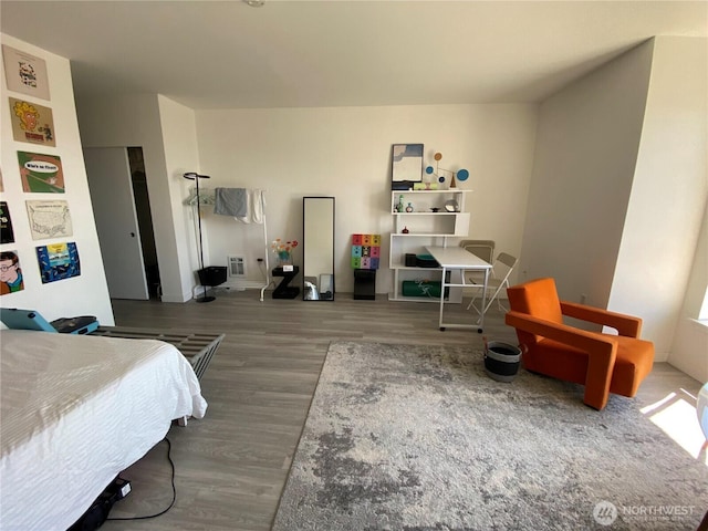 bedroom featuring wood finished floors