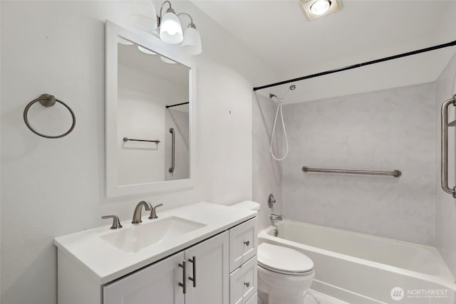 bathroom featuring shower / washtub combination, vanity, and toilet