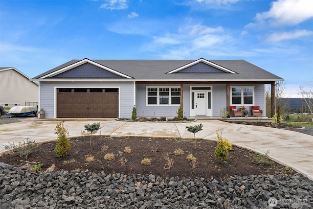 ranch-style house with a garage, a porch, and concrete driveway