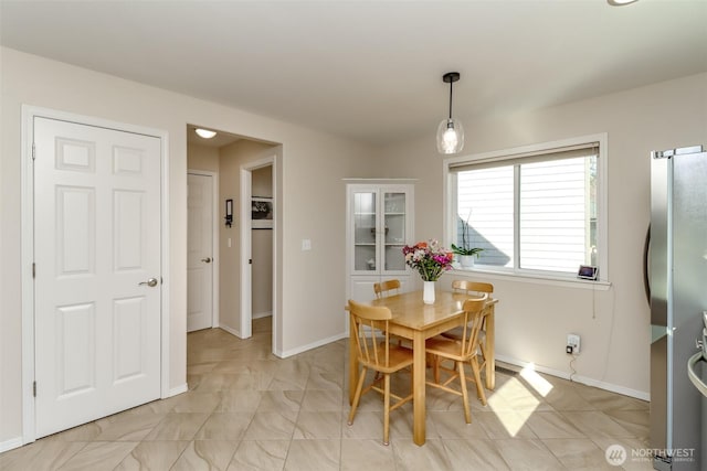 dining area with baseboards