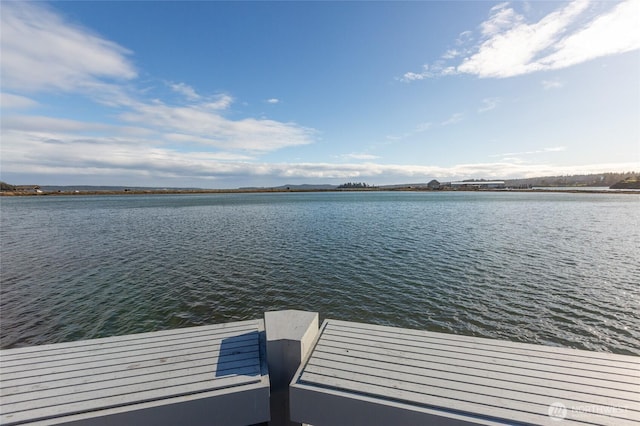 view of dock with a water view