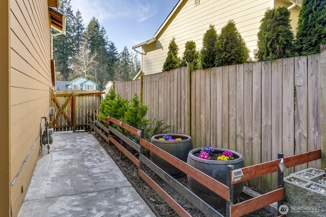 view of patio / terrace with a gate and fence