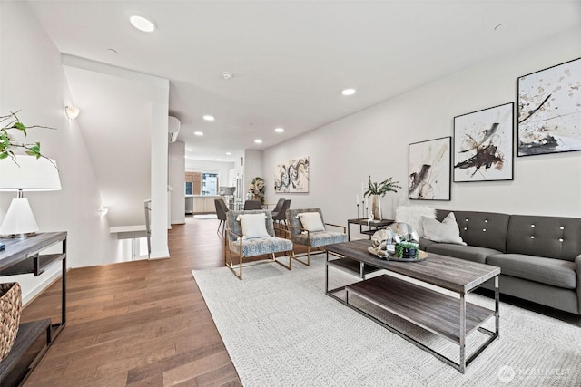 living area featuring recessed lighting and wood finished floors