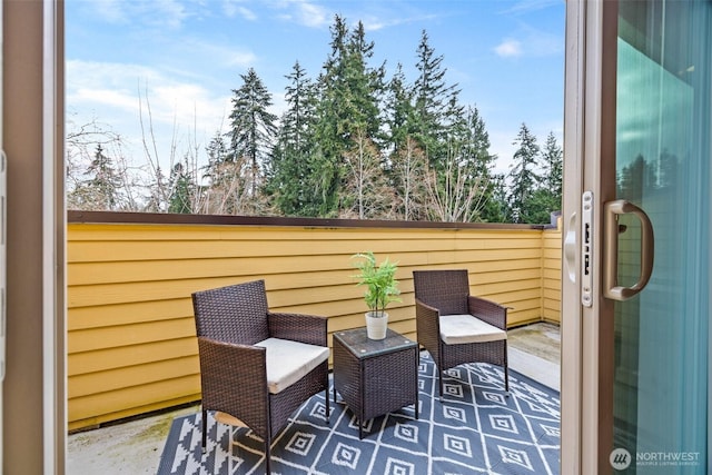 view of patio with a balcony