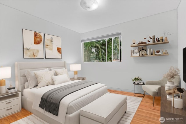 bedroom with light wood-style flooring