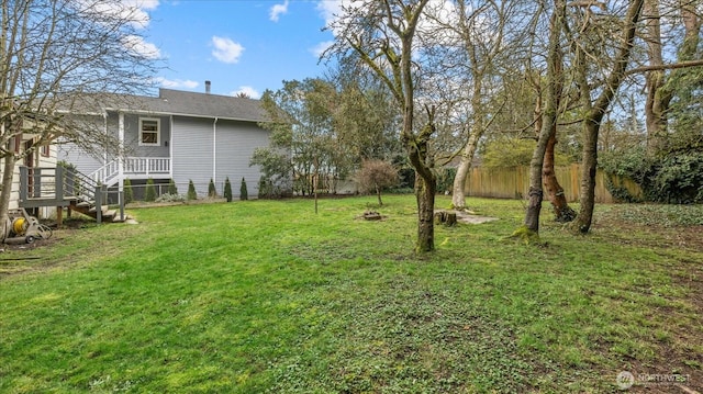 view of yard with fence