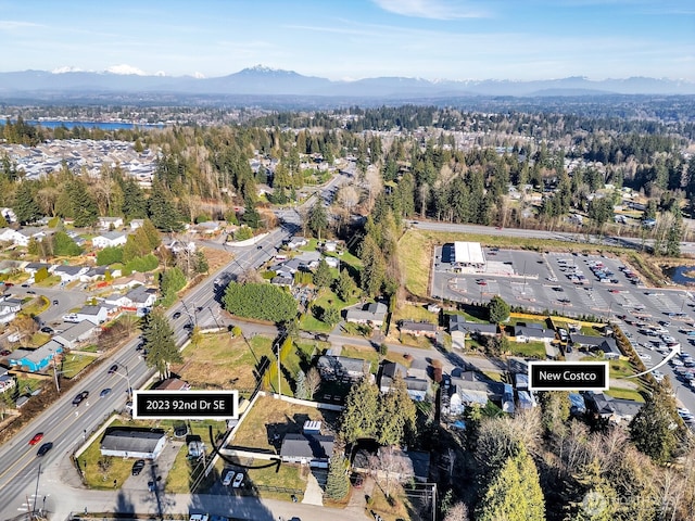 birds eye view of property featuring a mountain view