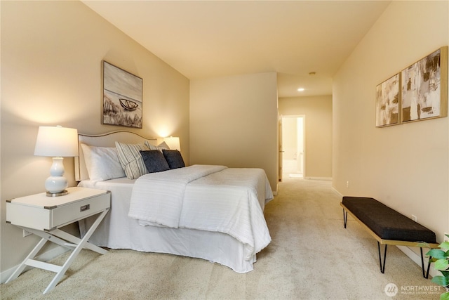 bedroom featuring baseboards and carpet floors