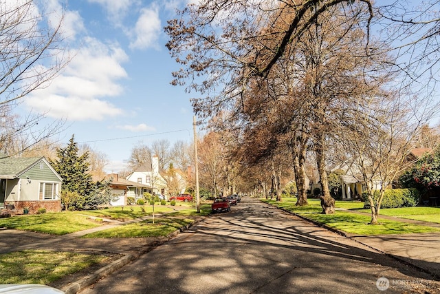 view of street featuring curbs