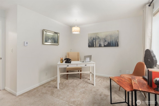 office area with baseboards and carpet floors