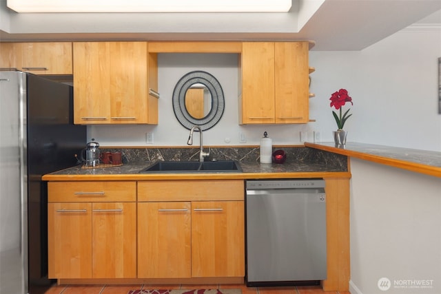 kitchen featuring open shelves, tile countertops, appliances with stainless steel finishes, and a sink