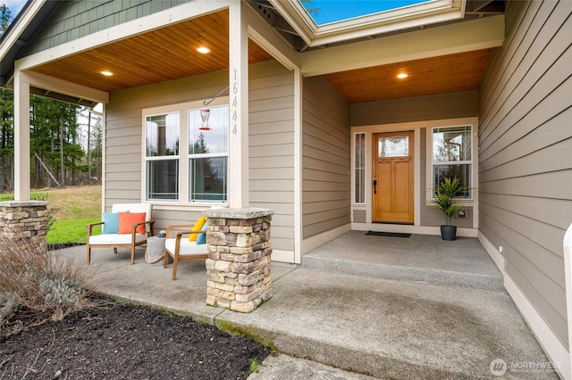 property entrance featuring a porch