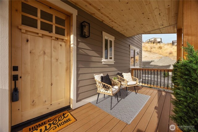 wooden deck with a porch