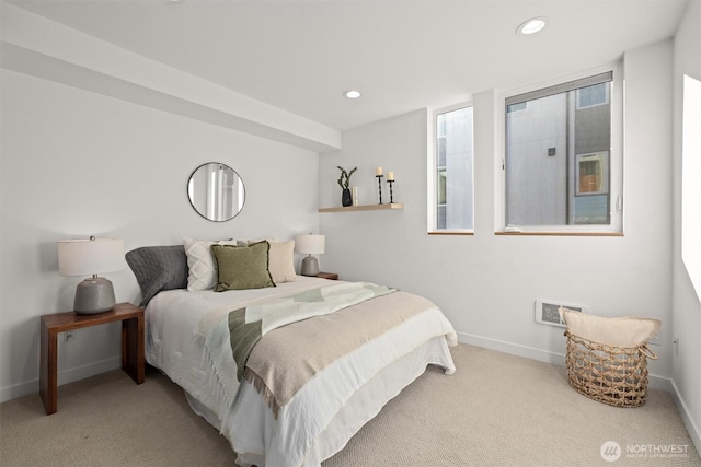 carpeted bedroom featuring baseboards, visible vents, and recessed lighting