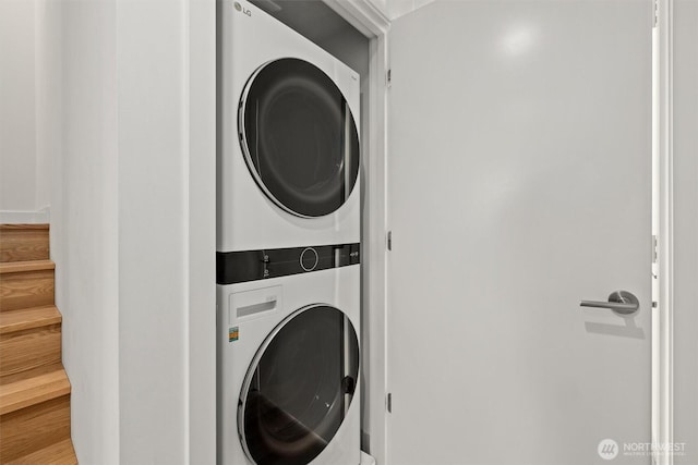 laundry area with laundry area and stacked washing maching and dryer