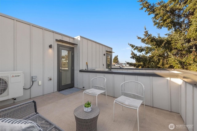 view of patio / terrace featuring ac unit