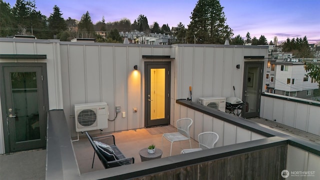 exterior space featuring ac unit and grilling area