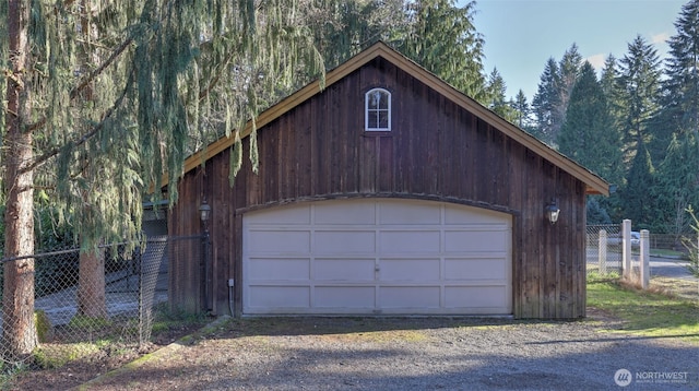 detached garage with fence