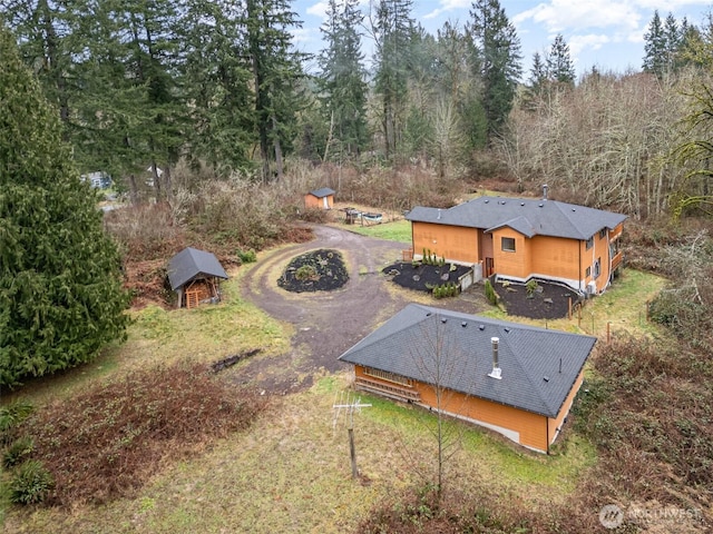 bird's eye view with a forest view