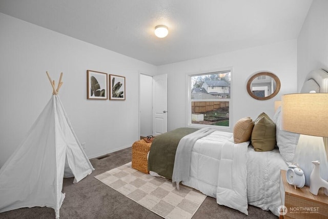 bedroom with light colored carpet