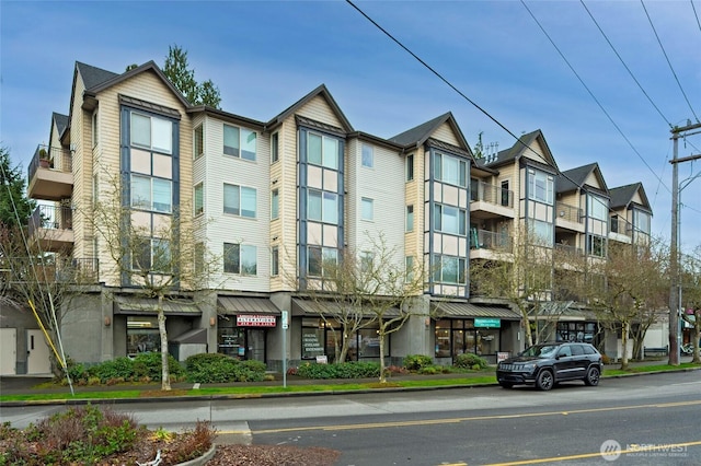 view of building exterior with a residential view