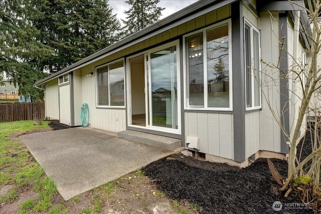 exterior space with a patio and fence