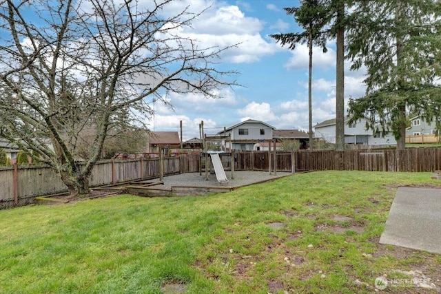 view of yard with a patio and a fenced backyard