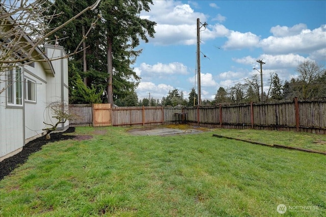 view of yard featuring a fenced backyard