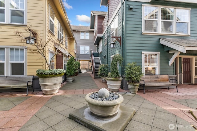 view of patio with stairway