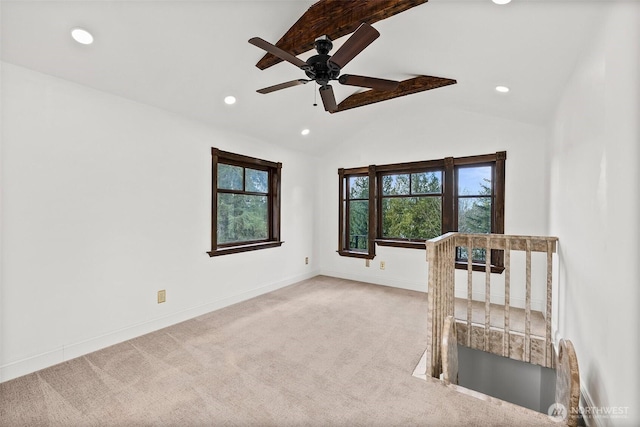 spare room with baseboards, a ceiling fan, lofted ceiling, carpet, and recessed lighting