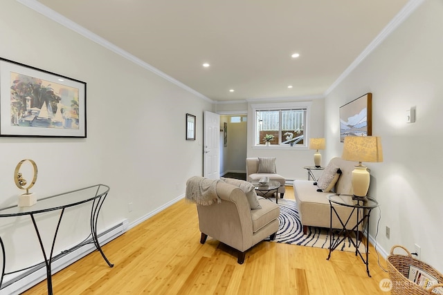 living area featuring light wood-style flooring, crown molding, a baseboard heating unit, and baseboards