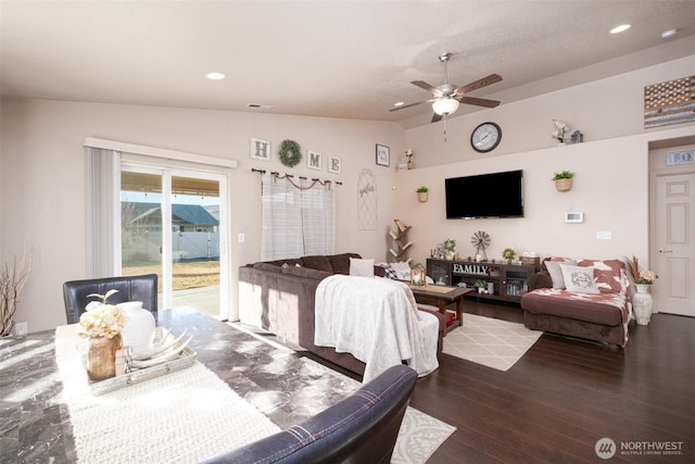 dining space featuring lofted ceiling, recessed lighting, visible vents, ceiling fan, and wood finished floors