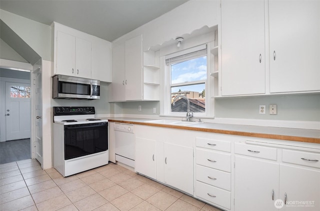 kitchen featuring a sink, open shelves, white appliances, white cabinets, and light countertops