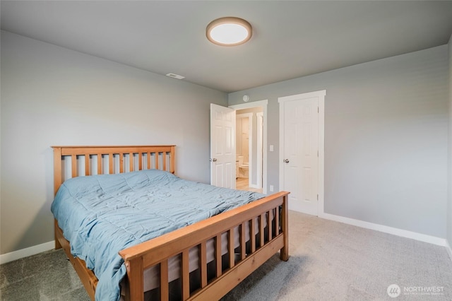 bedroom featuring carpet, visible vents, and baseboards