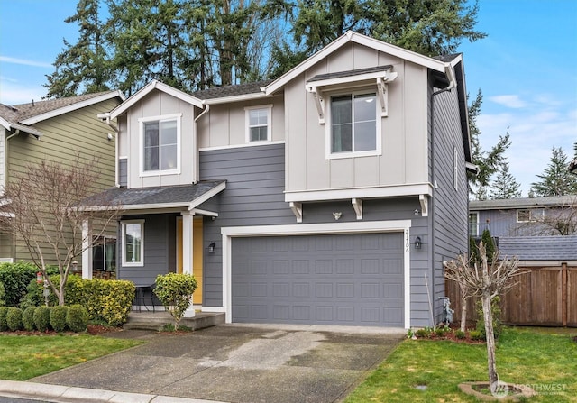 view of front of house with concrete driveway, an attached garage, fence, a porch, and board and batten siding