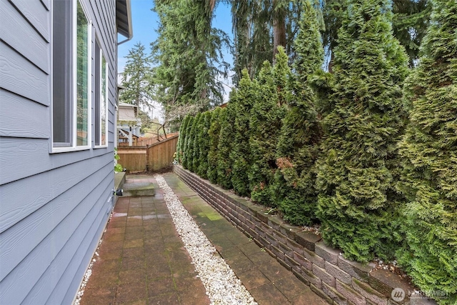 view of yard featuring fence