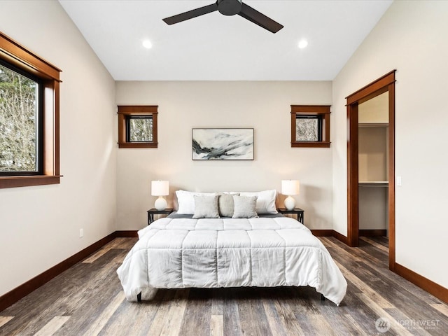 bedroom featuring dark wood finished floors, recessed lighting, baseboards, and a ceiling fan