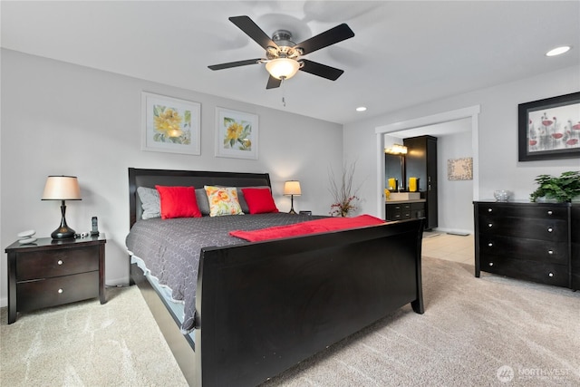 carpeted bedroom featuring recessed lighting and a ceiling fan